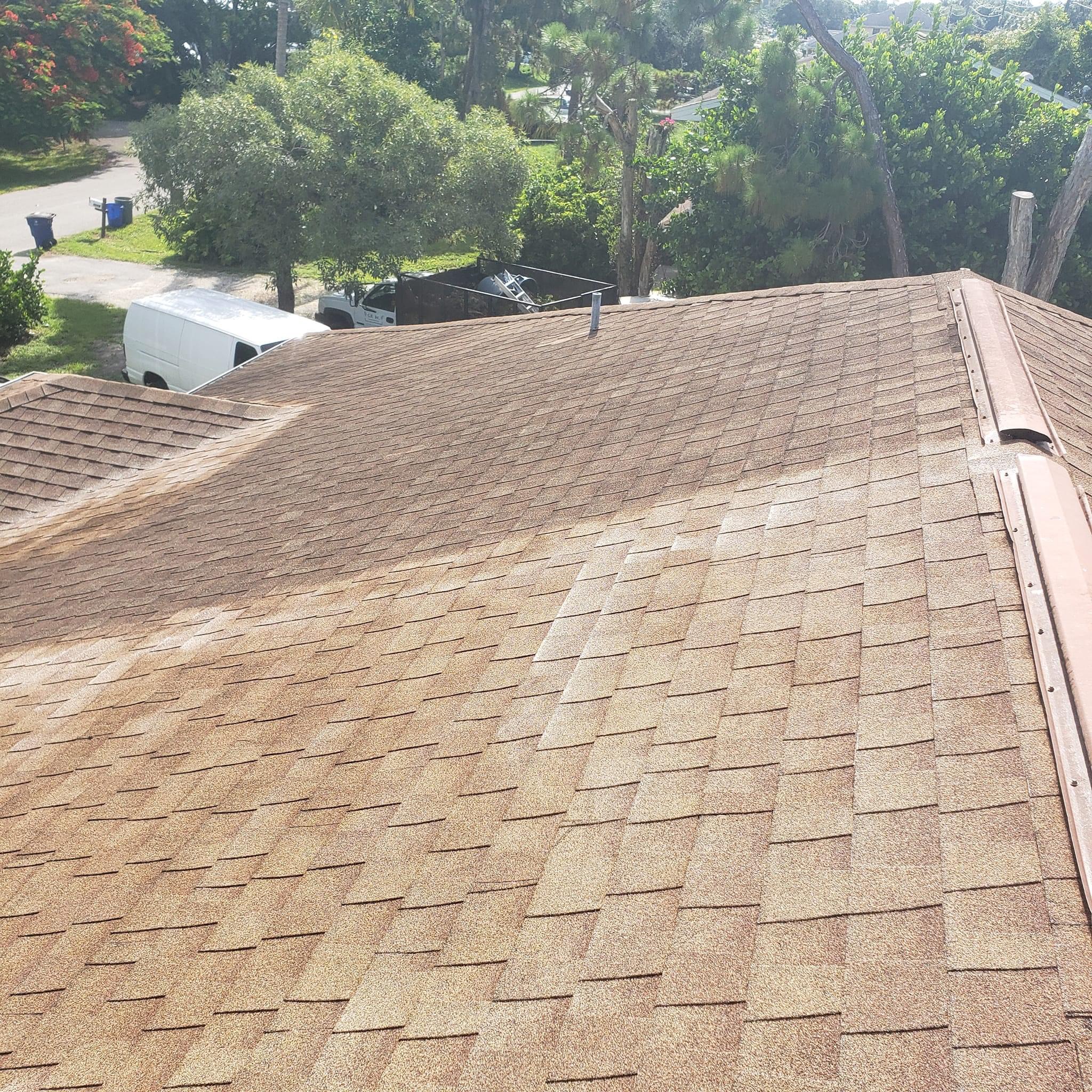 Roof soft washing in Sarasota County.