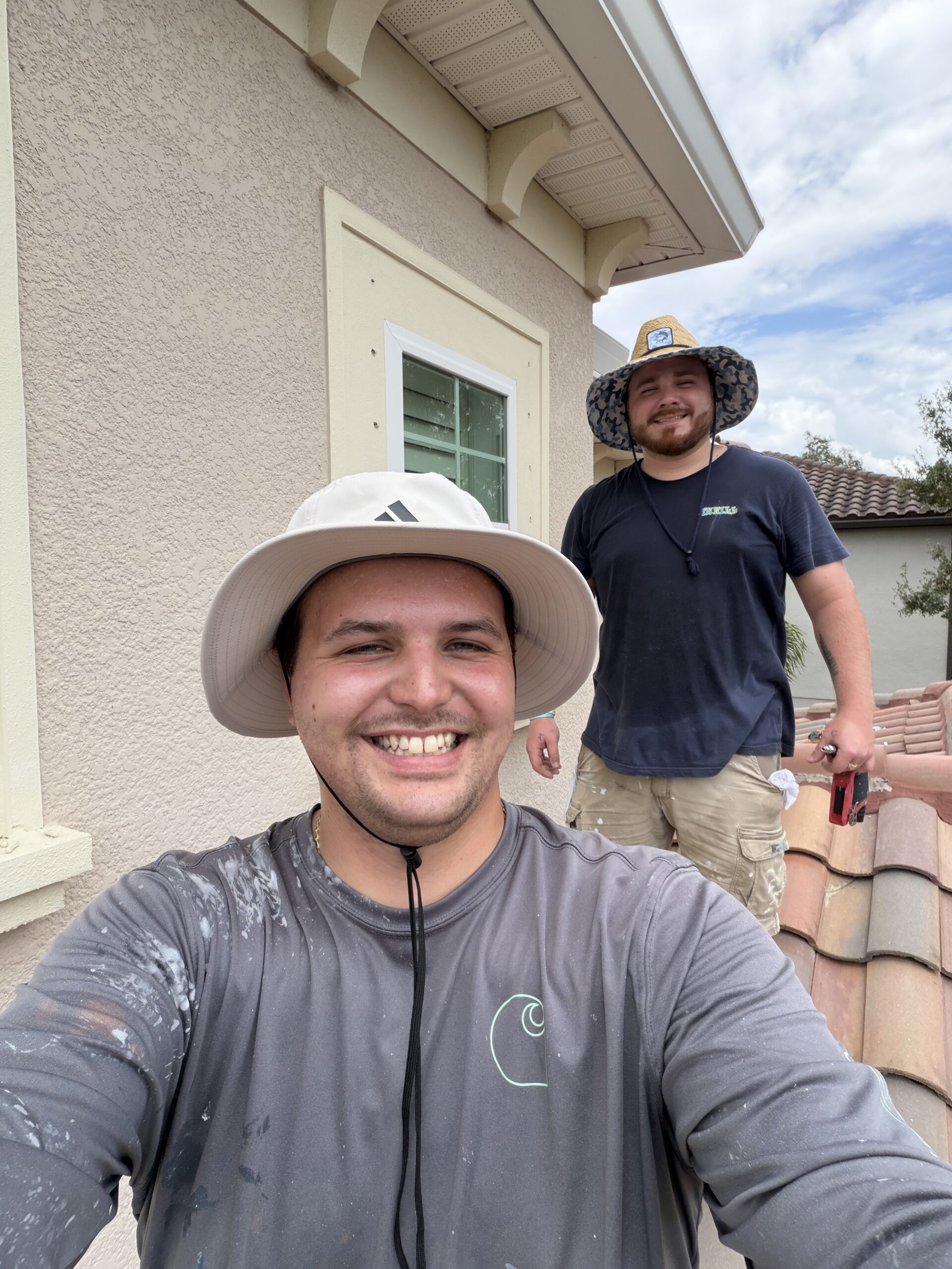 Chase, owner-operator of Gulf Coast Painting SRQ, working on a Sarasota project